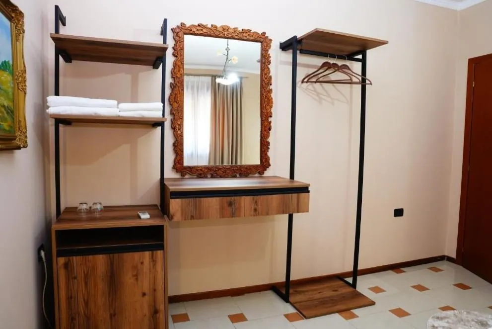 Room detail at Vila 15 &mdash; mirror and wardrobe