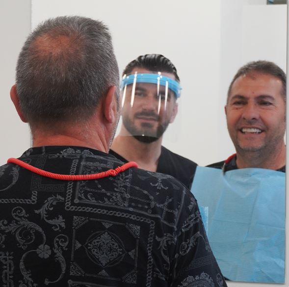 Smiling patient at the Elonix dental clinic in Tirana