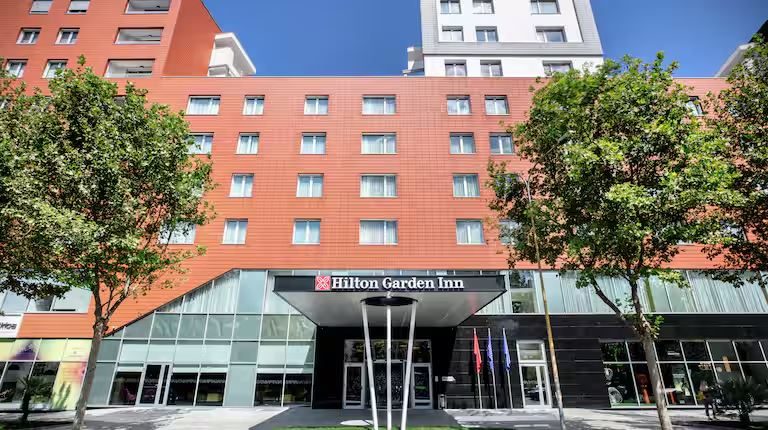 The Hilton Garden Inn Tirana &mdash; the facade with the hotel sign