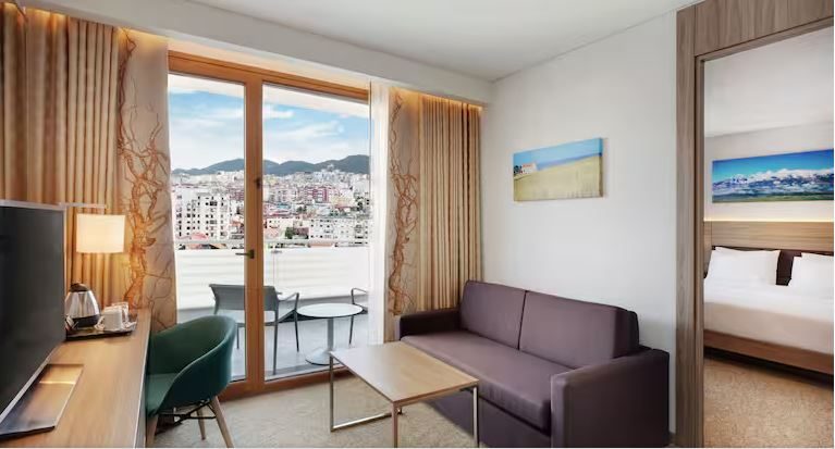 A room at the Hilton Garden Inn Tirana, looking out over the city