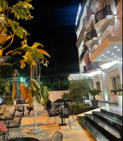 The Imperator Hotel in the evening, with its terrace lit