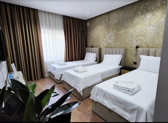 A triple room at the Imperator Hotel &mdash; for travelling with company