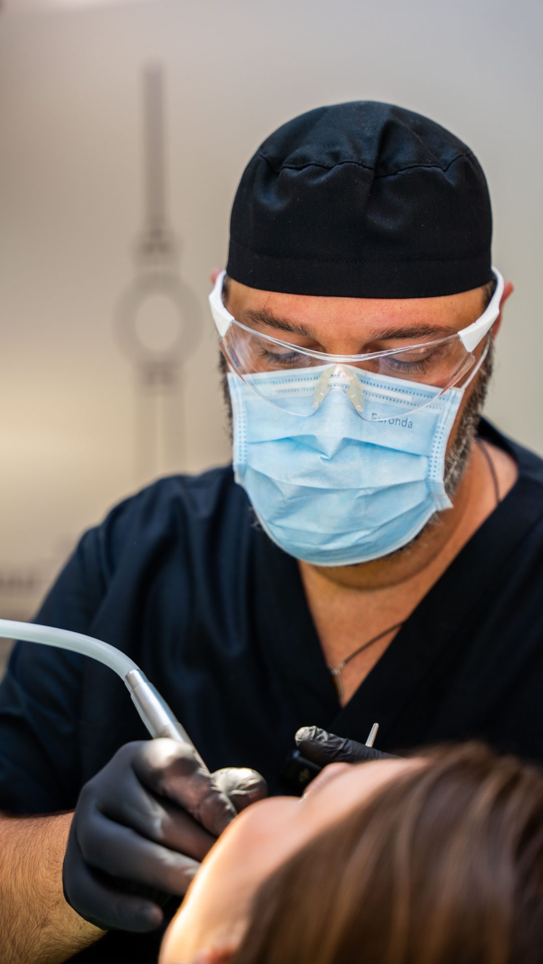 Dr. Gjergj Dilo operating at DentX Clinic, Tirana