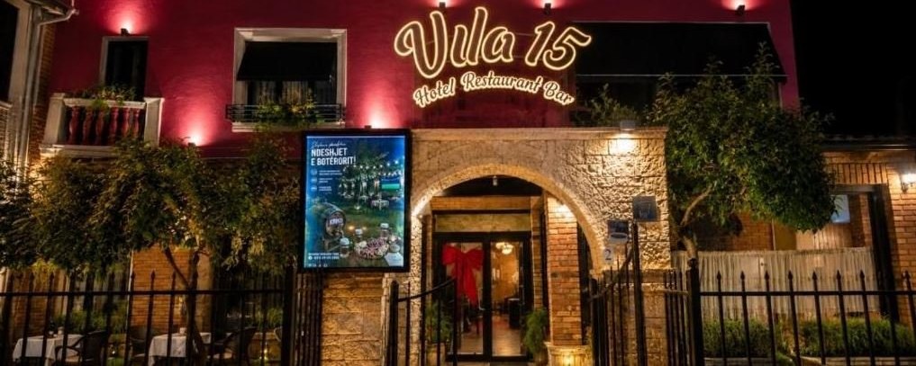 The facade of Vila 15 at night &mdash; hotel, restaurant and bar in Tirana