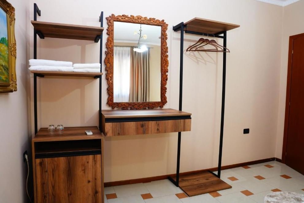 Room detail at Vila 15 &mdash; mirror and wardrobe